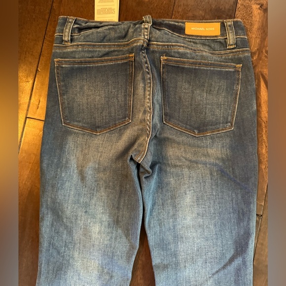 Michael Kors Medium Wash Faded Denim Low-Rise Flared Jean - Picture 6 of 6